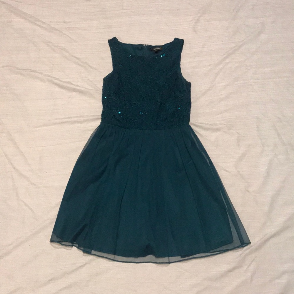 A turquoise dress